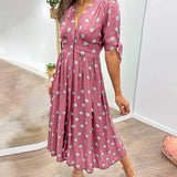 Mia™ - Robe à pois avec décolleté en V profond