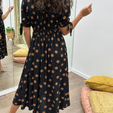 Mia™ - Robe à pois avec décolleté en V profond